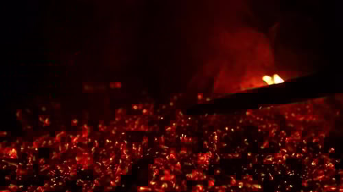 Burning Red Embers with Rising Smoke and Flame