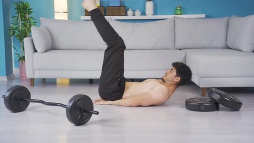 Man Doing Abdominal Exercises at Home
