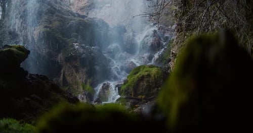 waterfall falling over the rock on slow motion hide the rock