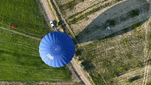 Hot Air Balloons Fly Over the Mountainous Landscape of Cappadocia Turkey