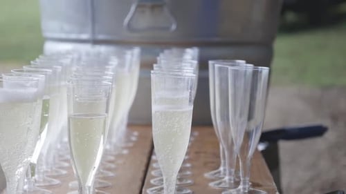 Champagne Glasses Prepared for Wedding Celebration Outdoors