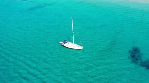 Yacht on lagoon at sunny day. Sailing boat. Yacht in the sea, aerial photography drone. Amazing yach