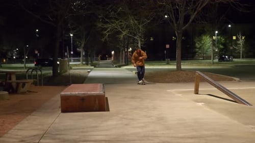 skateboarding at the skatepark at night time