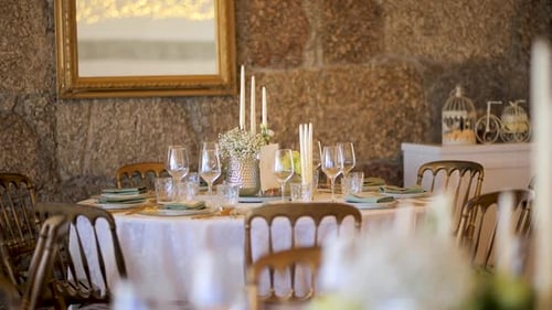 Elegant Wooden Table Setting with Floral Arrangements