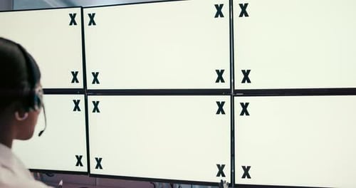 Computer screen, security and space for surveillance with woman in CCTV control room from back