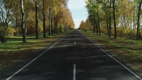 Aerial View of the Road Running Through the Rural European Countryside