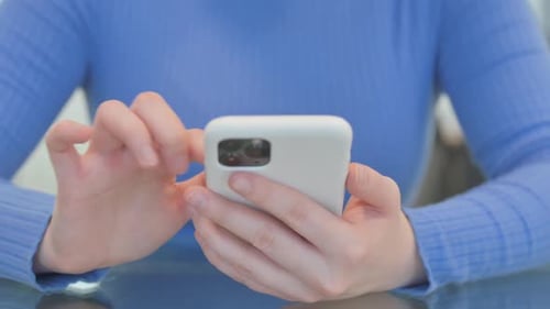 Close up of Woman Using Smartphone