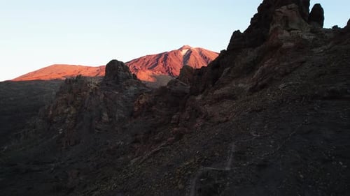 Mountain range in dry deserted landscape of Teide National Park. Scenery of highest volcano