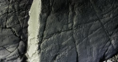 Rock Formation Revealing Intricate Textures and Patterns in a Natural Setting