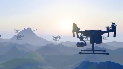 Drones Flying Over Mountain Landscape at Sunrise