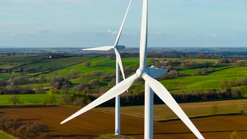 Sustainable Energy Production Clean Power Windmill Wind Turbine Spinning to Deliver Low Carbon Power