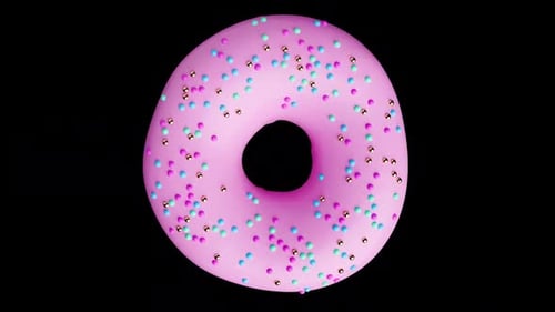 Sprinkles Rotating on a Black Background with Alpha Channel Matte. Seamless Loop of Doughnut