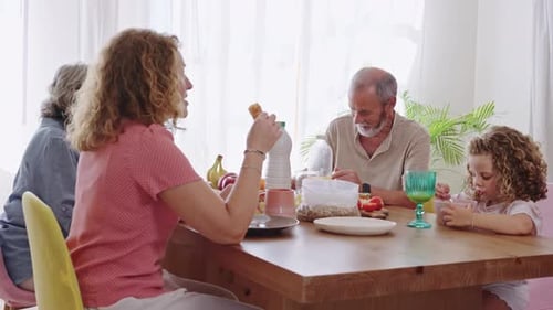 Family Breakfast at Bright Dining Table