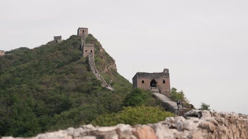 Overcast Sky Over Mosscovered Archaeological Site on Hill Preserved Heritage Site Featuring Ancient