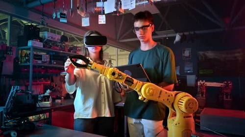 Young Adults Using VR to Control Robotic Arm