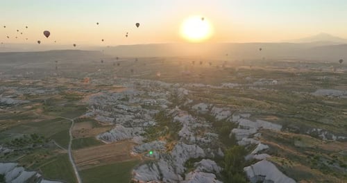 Aerial Cinematic Drone View of Colorful Hot Air Balloon Flying Over Cappadocia