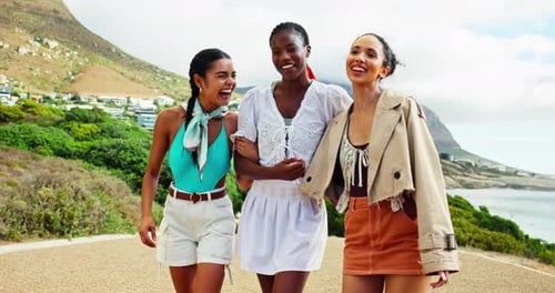 Three Happy Women Walking Together Outdoors