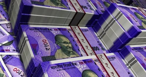 India Rupee 100 banknote packs - flying over INR money stack
