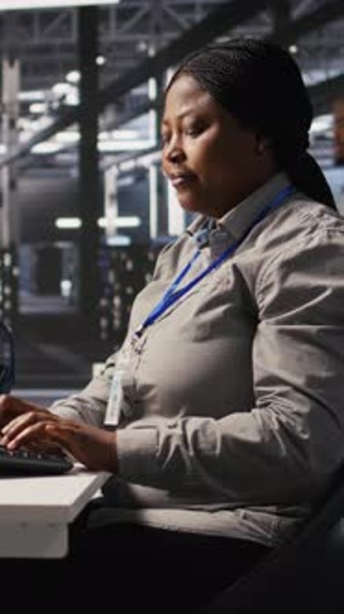 Vertical Video Data Center Expert Doing Software Updates Verifying Machine Learning Parameters