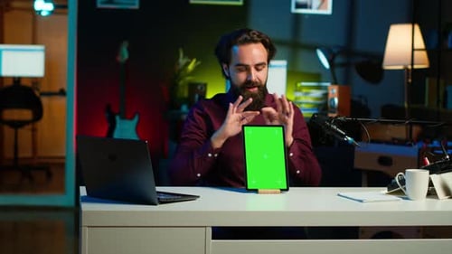 Tech Specialist Presenting Chroma Key Tablet