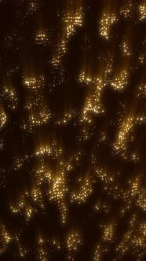 Vertical shimmering gold waves made of glowing particles