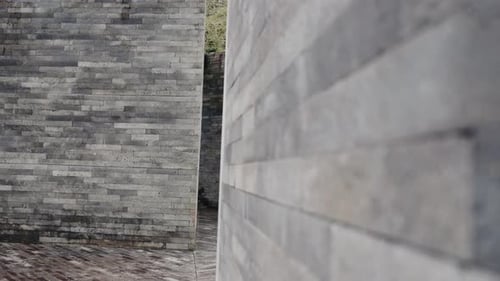 Brick Maze with Geometric Pattern and Wooden Path