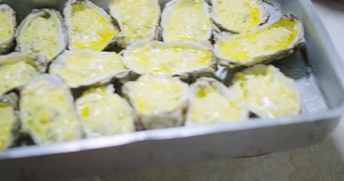 Delicious Baked Oysters with Cheese in Metal Tray