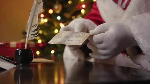 Santa Reading Letter at Cozy Christmas Time