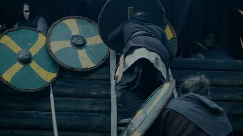 Large-Scale Medieval Battle Reenactment. Violent Tribe of Warriors Attack Wooden Fortress Wall, The