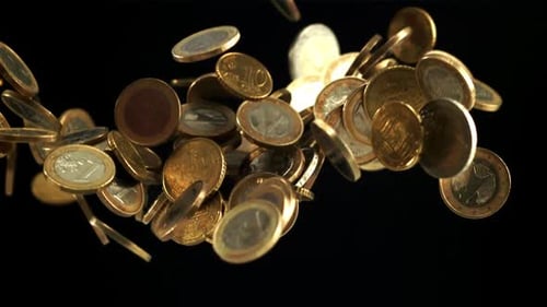 Coins Fly Up And Fall Down Filmed Is Slow Motion