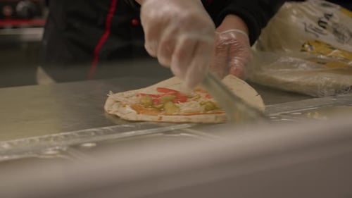 The process of creating fast food on street - shawarma, pita, doner kebab
