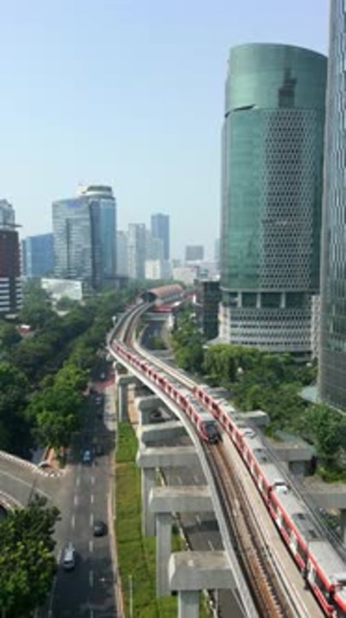 Aerial View of Skytrain and Traffic in Downtown Jakarta Indonesia
