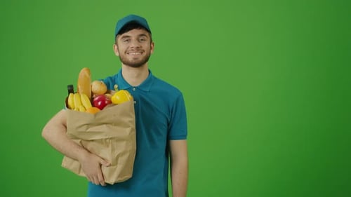 Green Screen Delivery Man Brings Paper Bag with Food