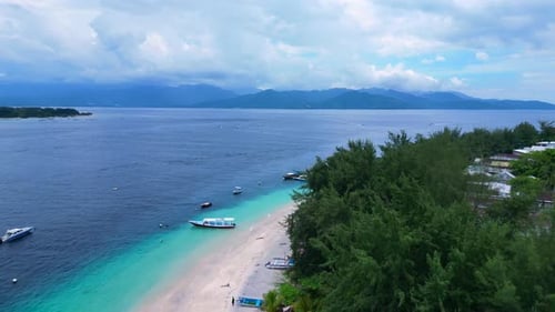 island paradise beach with boats in turquoise water. Magic aerial view drone