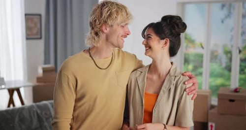 Happy Couple with Keys in New Home