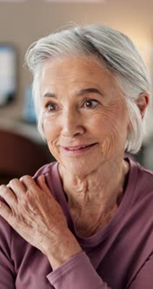 Senior, woman or shoulder pain at physiotherapy in clinic for injury, rehabilitation