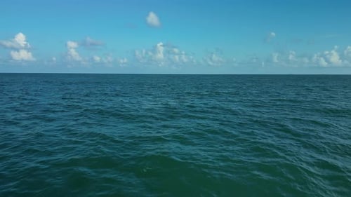 Open Sea and Sky with Clouds Aerial View Marine Background Shot From a Drone