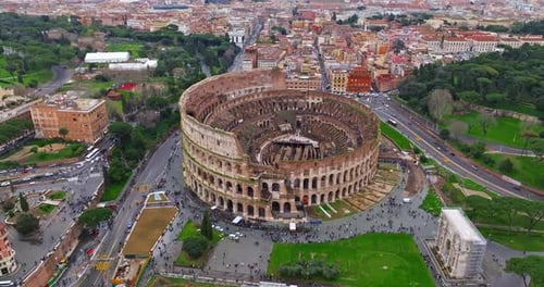Aerial View of Iconic Ancient Arena of Colosseum at Sunset Flavian Amphitheatre in the Heart of Rome