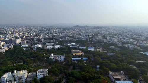 Afternoon in Aerial footage of Hyderabad, Telangana, India's urban residential and commercial hubs