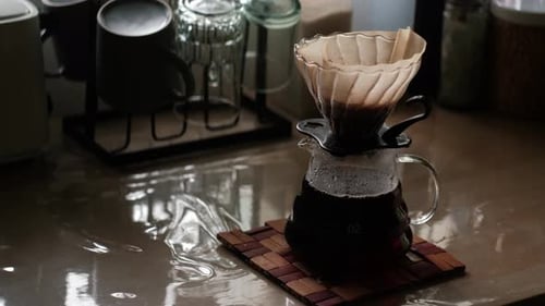 Coffee Maker Dripping Fresh Brewed Drink at Home