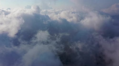 Aerial View of Clouds Filling the Bright Sky