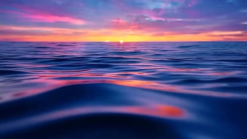Ocean Waves at Sunset with Vibrant Pink and Purple Sky