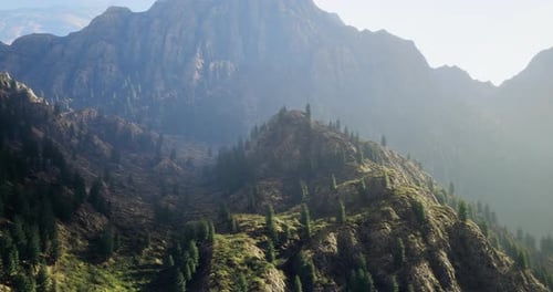 Majestic Mountains Rise Above Lush Valleys Under the Soft Morning Light