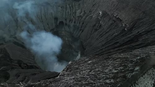Aerial View Flying to Mount Active Volcano Cloudy Bromo Crater