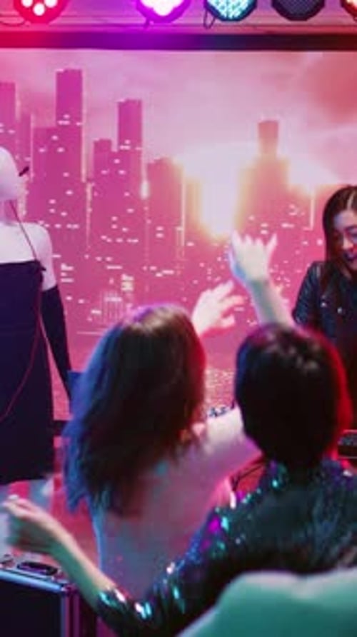 Singer Performing to Dancing Crowd at Nightclub