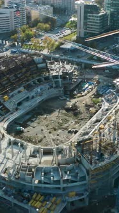Top View of Construction of Sports Arena with Cranes Stock Footage Construction of Sports Arena in