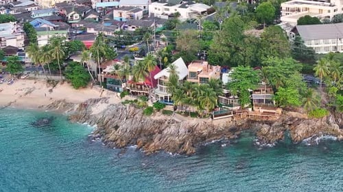 Seaside Villas On Rocky Kalim Hill In Patong, Phuket, Thailand. aerial orbiting shot