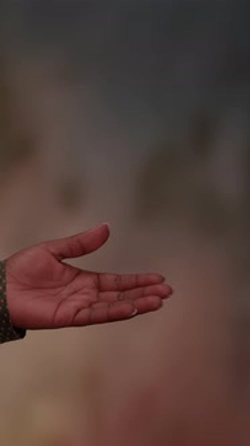 Hand Receives Package of Pills in Portrait Video