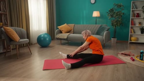 Senior Woman Stretching During Home Workout