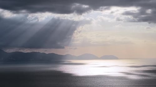 Aerial view of sun rays over coastal islands